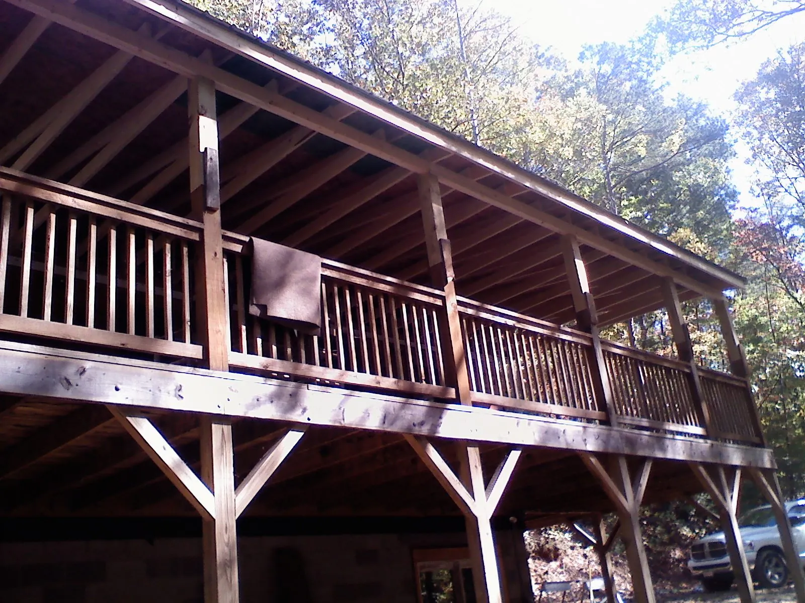 Timber framing under a new elevated porch and deck — Roof Leak Repair in Tallmadge by Roofing Brothers